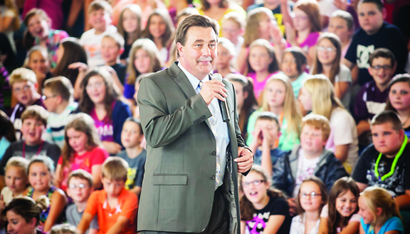 Director of Schools Dr. Kevin Ward tells Hunter Elementary School students that their school and Happy Valley Forge Elementary School were named "Reward Schools" by the Tennessee Department of Education.