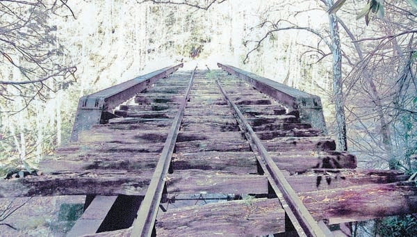 Photo contributed The deck of a railroad bridge in the Roan Mountain area has deteriorated to the point that it is no longer safe to walk over. Edward Lee Johnson would like to see bridges on the route  restored and the railroad bed made into a trail. 