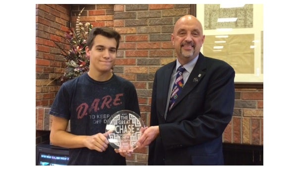 Jake Higgs, at left, was the first daily winner of Carter County Bank's The Great  Shown with Jake is Duncan Street, local president of Carter County Bank