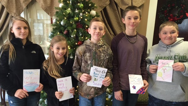 Contributed photo Students from Happy Valley Middle School recently made Christmas Cards to be delivered to residents of a local nursing home. Pictured from left to right are Casey Campbell, Abigail Rush, Spencer Babb, Tristan Tipton and Dakota Chess.