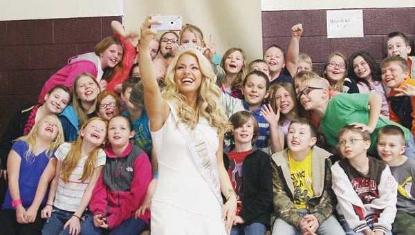 Star Photo/Abby Morris-Frye  Miss Tennessee Hayley Lewis takes a selfie with students at Happy Valley Elementary School.