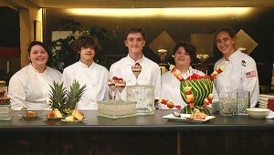 Star Photo/Abby Morris-Frye  From left: Sous Chef Cassidy Hughes, students David Floyd, Kenny Wagoner and Macey Davis and Chef Em Nidiffer.