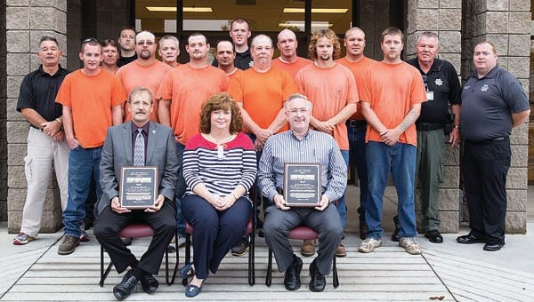 Star Photo/Abby Morris-Frye  On Wednesday, Carter County Mayor Leon Humphrey honored Carter County Sheriff Dexter Lunceford, sheriff's department staff and inmate work crews for their help in completing a pair of county projects over the summer.