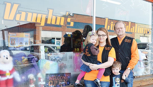 Star Photo/Rebekah Price (From right) Owner Brian Vaughn, Assistant Manager Brianna Broyles and her children Harmony and Bentley are happy to offer naitonal products locally for an affordable price.