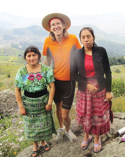Contributed Photo  LaPorte stands on the summit of Volcán Cuxliquel with Lucy and Marta, friends of his host in San Cristóbal, Totonicapán, Guatemala.