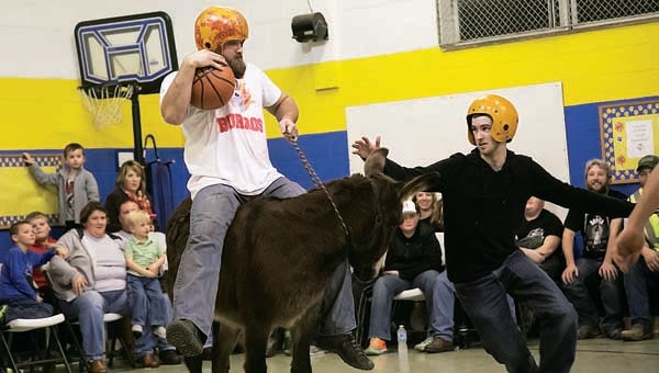 Star File Photo The theme of the night  during last year's game was defense... and staying on your donkey.