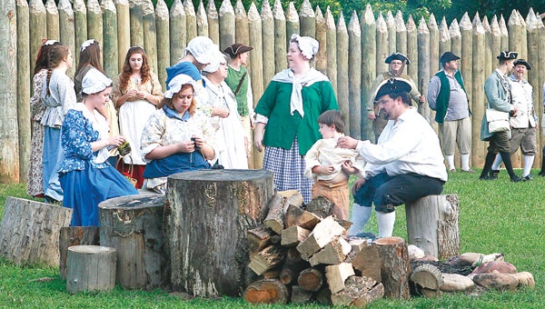 Star File Photo  During a performance of Liberty! The Saga of Sycamore Shoals, actors portraying early settlers show what life might have been like for those living on the frontier.