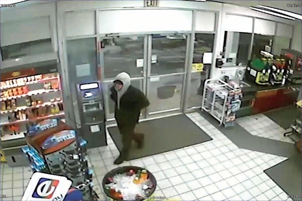 Contributed Photo  Investigators are asking for the public to help them identify this man, who police say robbed a local convenience store while armed with a utility knife.
