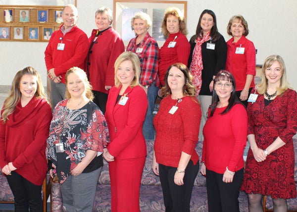 Contributed Photo  Some administrative team members at Sycamore Shoals Hospital wore red Friday as part of National Wear Red Day to spread awareness about Heart Month and preventative heart health.