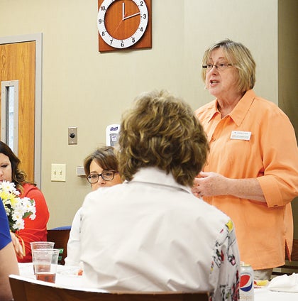 Star Photo/Rebekah Price  UT Extension Agent Vickie Clark explains the professionalism and level of care provided by her nurse Barbara Nave in the Intensive Care Unit.