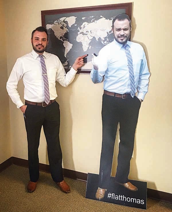 Contributed Photo In an effort to raise money through the Carter County Relay For Life, #flatthomas, a cutout of Edward Jones finanicial advisor Thomas A. Davis, will be making the rounds through the city, going on different adventures.