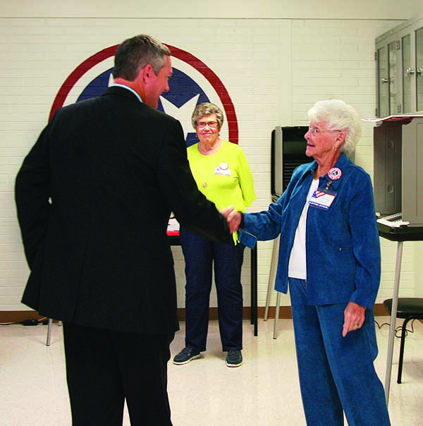 Star Photo/Abby Morris-Frye Tennessee Secretary of State Tre Hargett spekas with local election worker Shirley Gentry during his visit to the Carter County Election Office on Thursday.