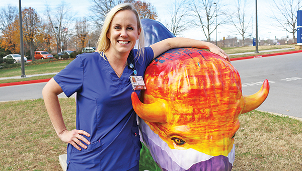Star Photo/Curtis Carden Milligan College graduate Samantha Turbyfill shared the story of taking a photos atop Brutus, pictured. The Elizabethton native graduated from Milligan College during Commencement on Friday, Dec. 9.
