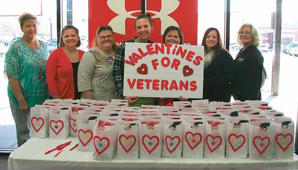 Star Photo/Abby Morris-Frye To help honor local veterans, Shoe Sensation sponsored a special sock drive to collect warm socks and other Valentine's gifts for veterans living in local nursing homes. On Monday, representatives of several local nursing homes picked up the gifts for the veterans in their care.