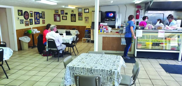 Come on in and sit right down... Local restaurants reopen doors to